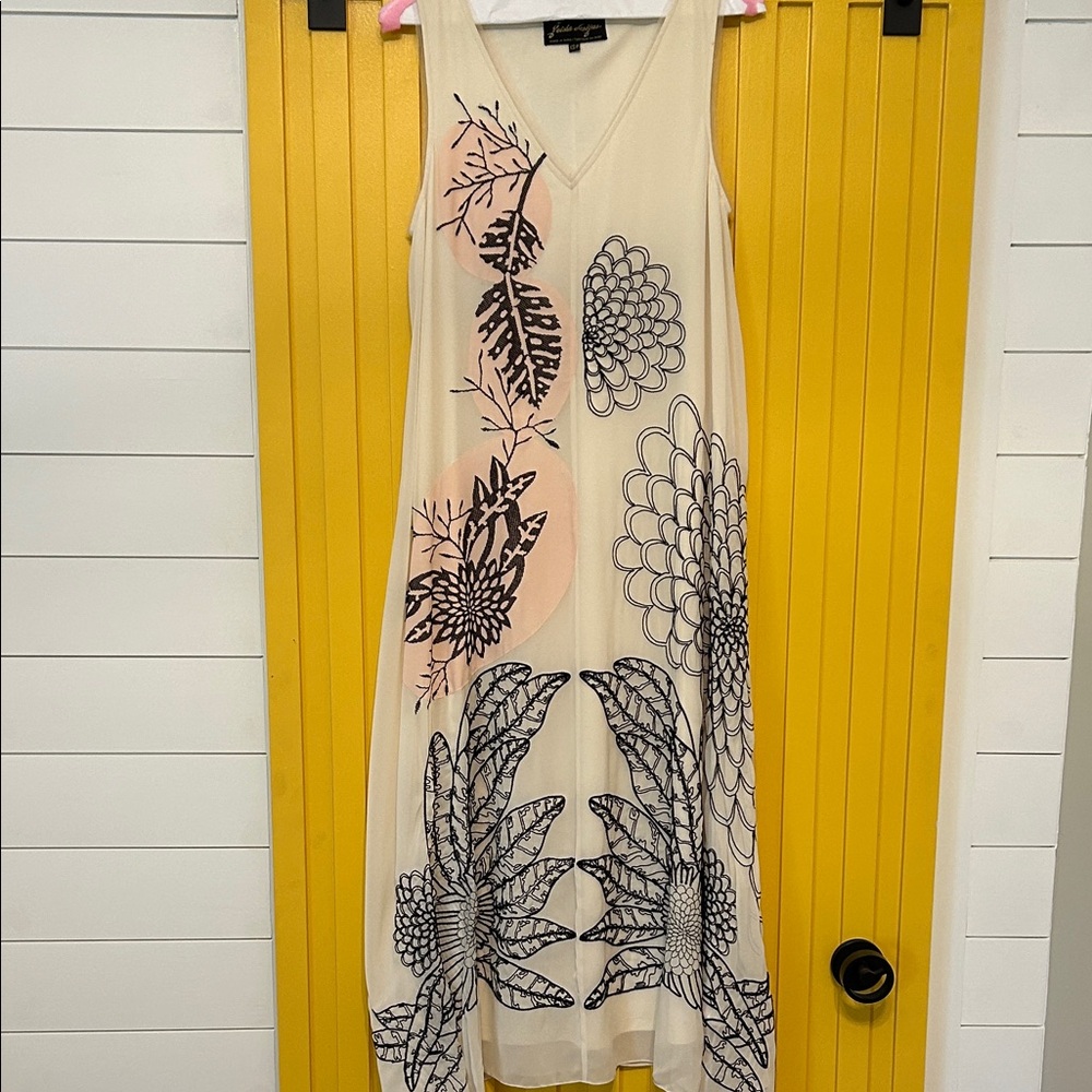Elegant Cream Maxi Dress with Black Floral Pattern